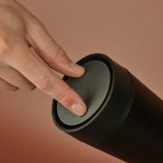 Lifestlye image of the 12oz Circular & Co. Reusable Coffee Cup Made From Recycled Coffee from Total Merchandise