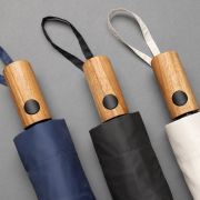 Lifestyle image of the rPET Wood Mini Auto Open Umbrella with a design from Total Merchandise