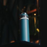 Lifestyle image of the Omni Sip Recycled Lockable Bottle from Total Merchandise