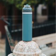 Lifestyle image of the Omni Sip Recycled Lockable Bottle from Total Merchandise