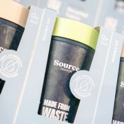 Lifestyle image of the 8oz Circular & Co. Reusable Coffee Cup Made From Recycled Fabric