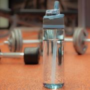 Lifestyle image of the Omni Sip rPET Water Bottle with a design from Total Merchandise