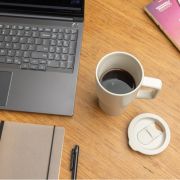 Lifestyle image of the 490ml Ceramic Luxe Quencher Tumbler in Warm Brown from Total Merchandise