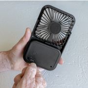 Lifestyle image of the Recycled Plastic Rechargable Desk Fan with a design  from Total Merchandise