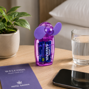 Lifestyle image of the Handheld Battery Pocket Fan by Total Merchandise