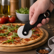 Lifestyle image of the customised Pizza Cutter with Bottle Opener by Total Merchandise