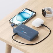 Lifestyle image of the customised Belkin Power Bank With Integrated Cable by Total Merchandise