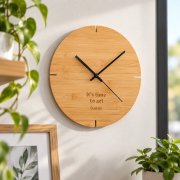 Lifestyle image of the Bamboo Wall Clock custom engraved by Total Merchandise