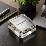 Lifestyle image of the Optical Crystal Square Paperweights by Total Merchandise