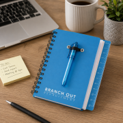 Lifestyle image of the Spiral Bound Ruler Notebook with Ballpen by Total Merchandise
