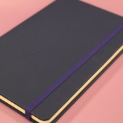 Lifestyle image of the Luxury Soft Feel Notebooks with a design from Total Merchandise
