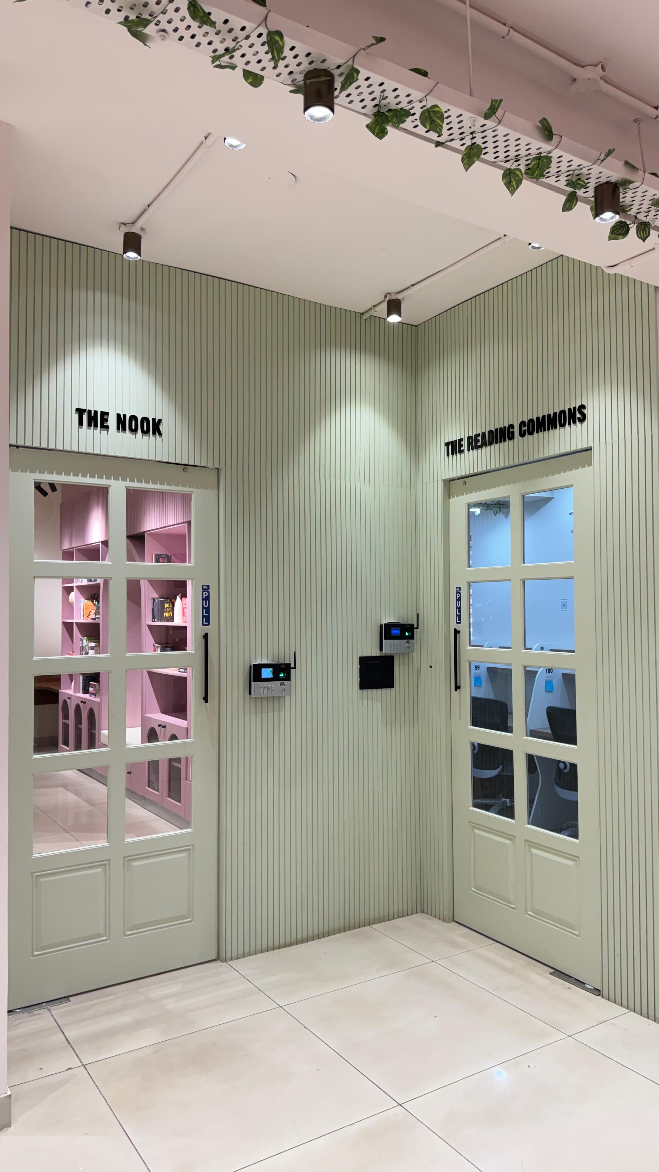 Blush armchair reading corner at Bookverse