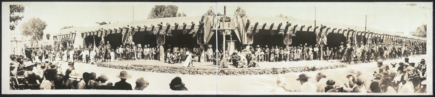 A sepia toned panoramic image of the Santa Fe Fiesta, de Vargas Day, dated 1921
