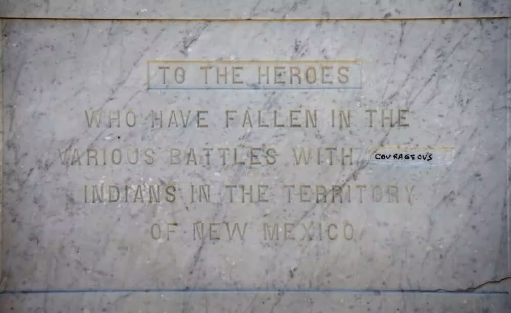 Image of the inscription of the Obelisk that shows where the word “savage’ had been removed and where someone had written in the word, “courageous.”