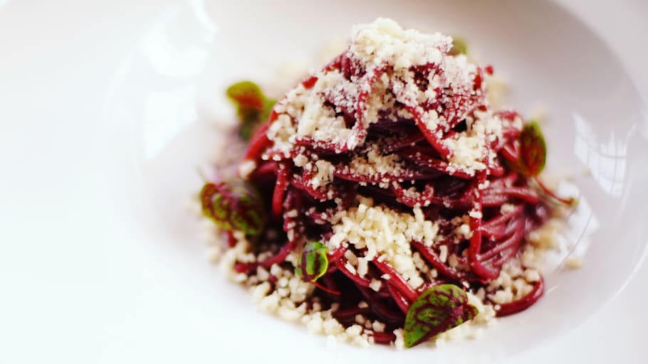 an image of a plate of beet flavored and colored pasta