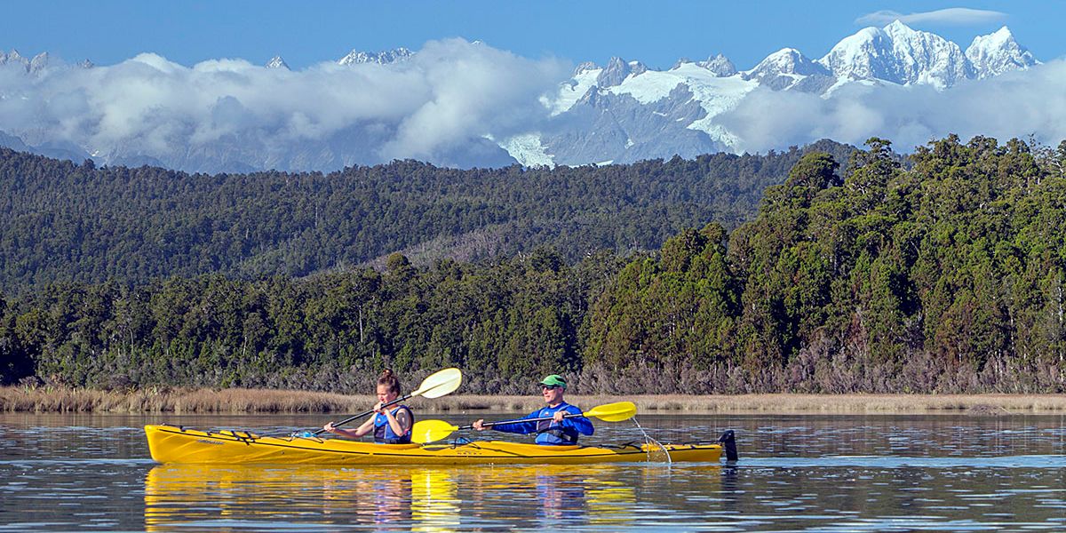 Hike coastal forest and beach, kayak Okarito Lagoon (optional)