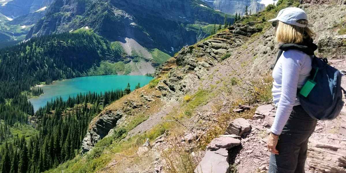 Hike alongside Swiftcurrent Lake to Grinnell Lake. Night on your own in Many Glacier