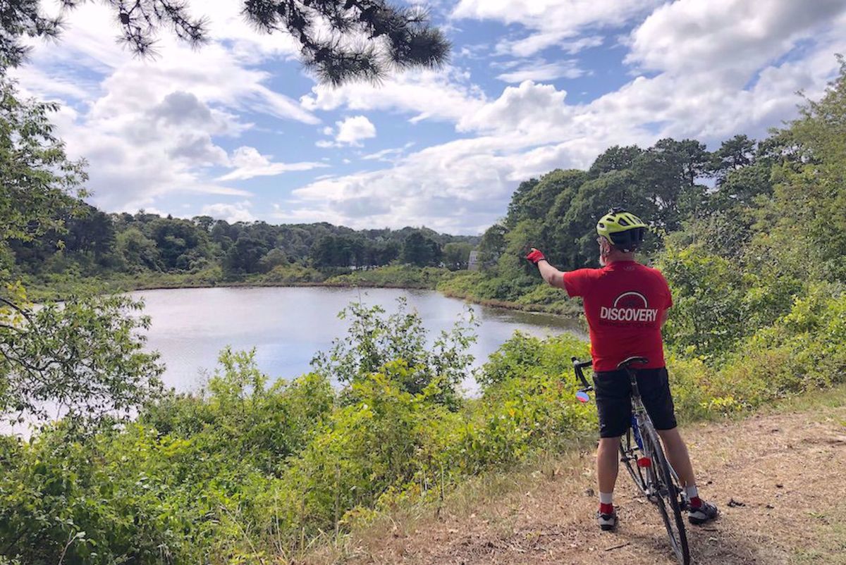 Cape Cod Explorer Bike Tour Riding by pond on Cape Cod