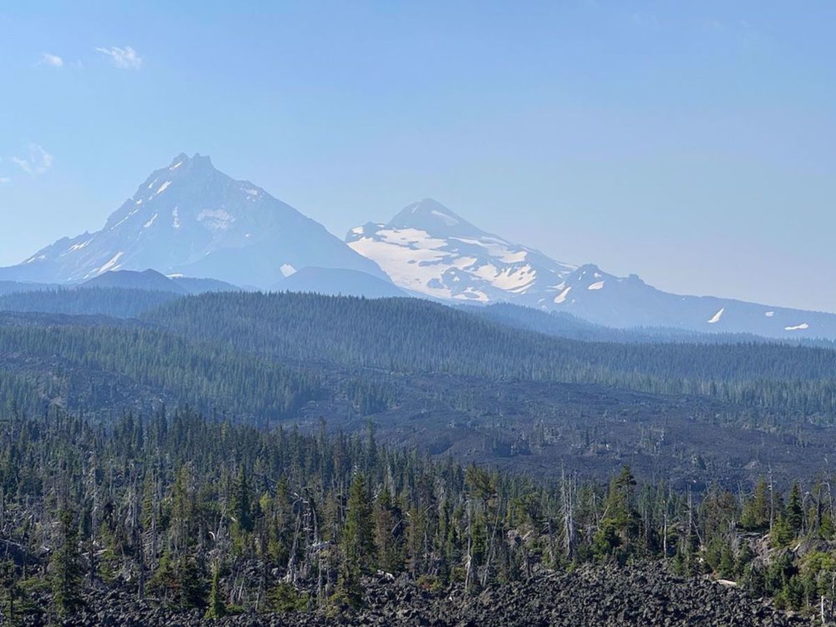 Crater Lake Getaway Bike Tour Mountains in the distance Oregon