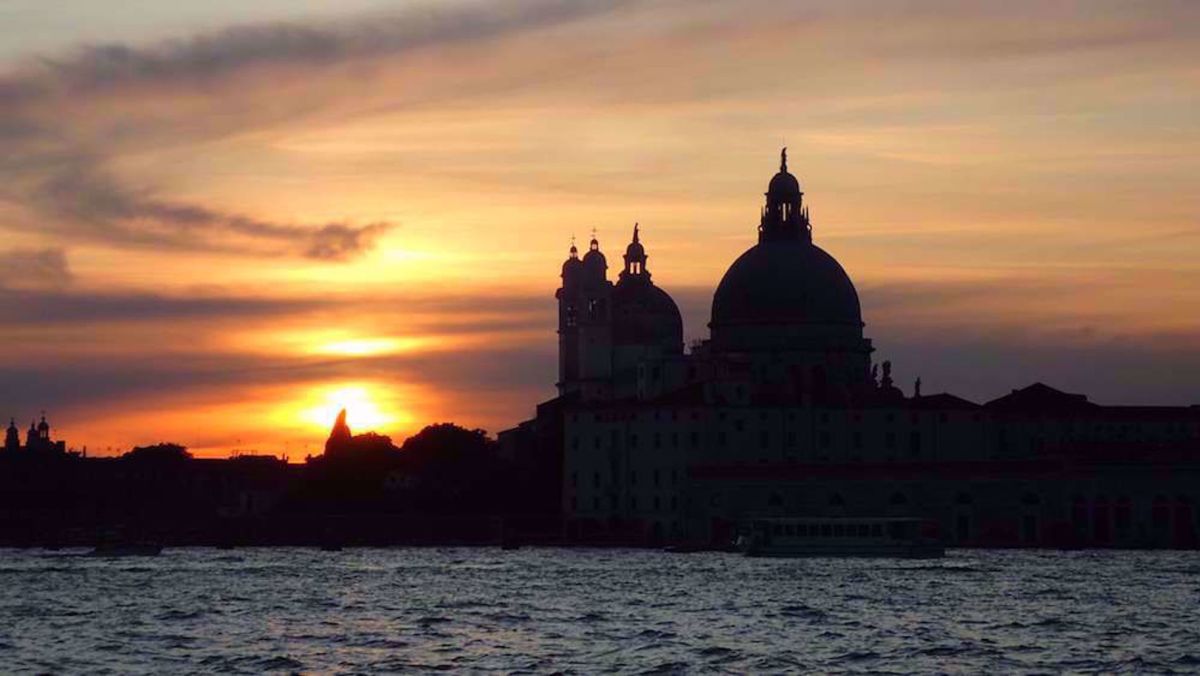 Dolomites to Venice Bike Tour Venice at sunset