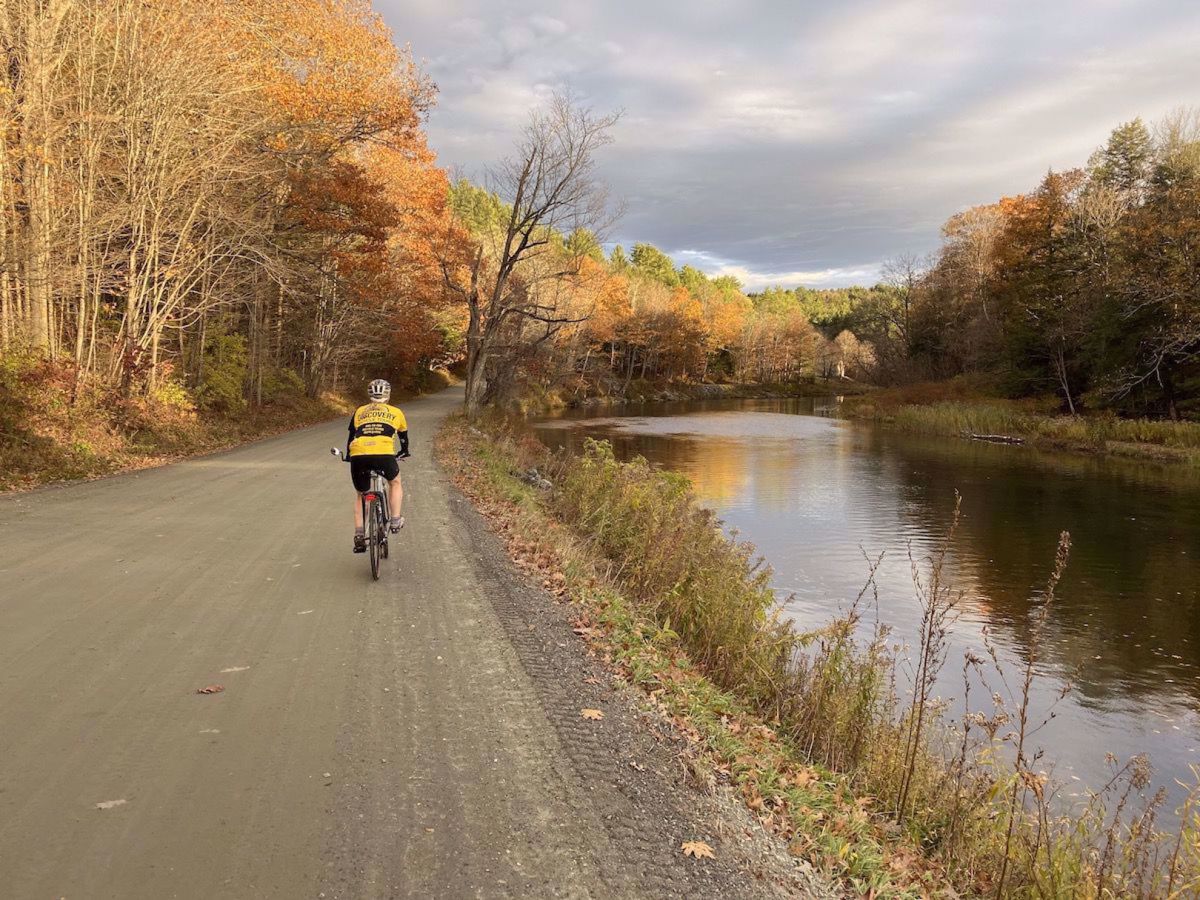 Woodstock Self Guided Bike Tour riding the trail in fall