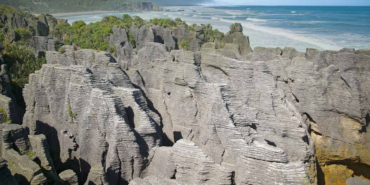 Hike Punakaiki rainforest and visit the Pancake Rocks