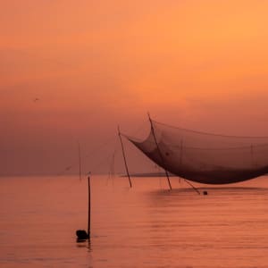 Hoi An & Quy Nhon Package mit Luxuszug ab Danang: Hoi An Thu Bon River traditional fishing net