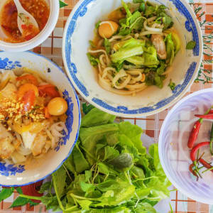 Vespa Street Food Tour in Saigon: Vietnamese noodle Mi Quang
