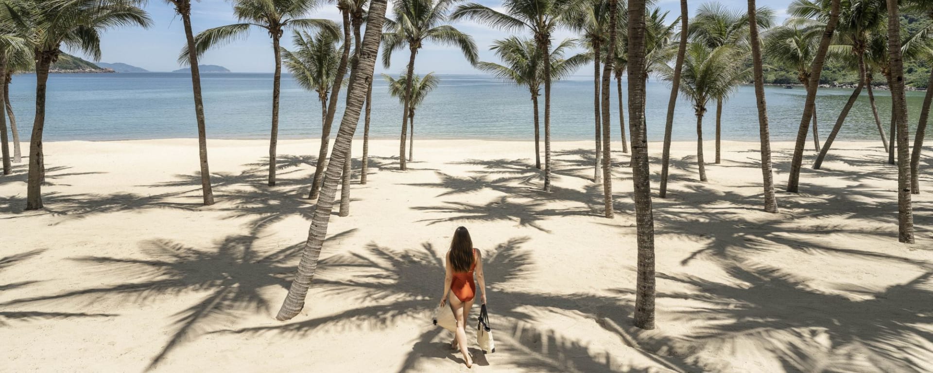 InterContinental Danang Sun Peninsula Resort:  Beautiful beach under palm trees