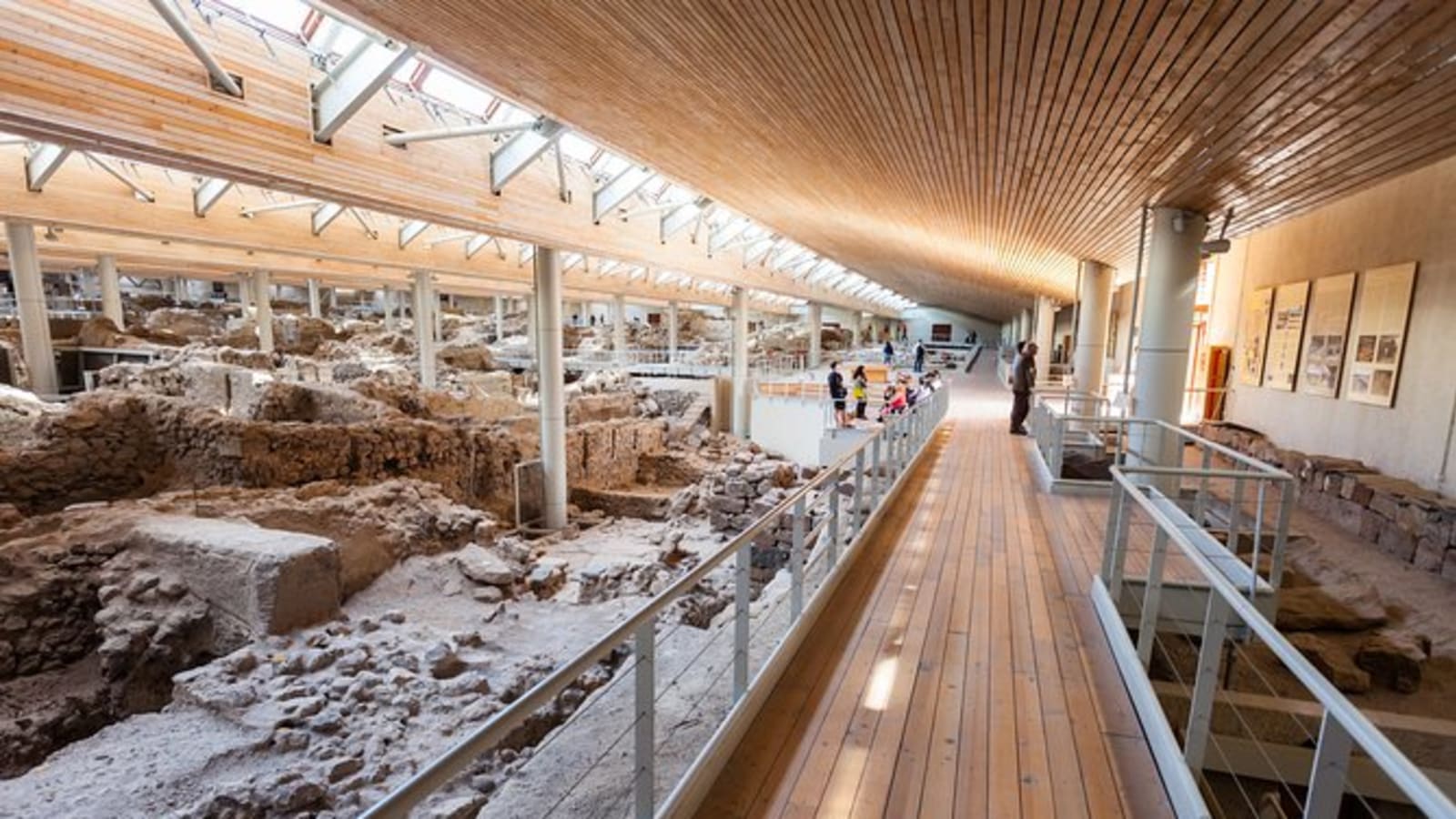 ARCHAEOLOGICAL BUS TOUR TO AKROTIRI EXCAVATION & RED BEACH