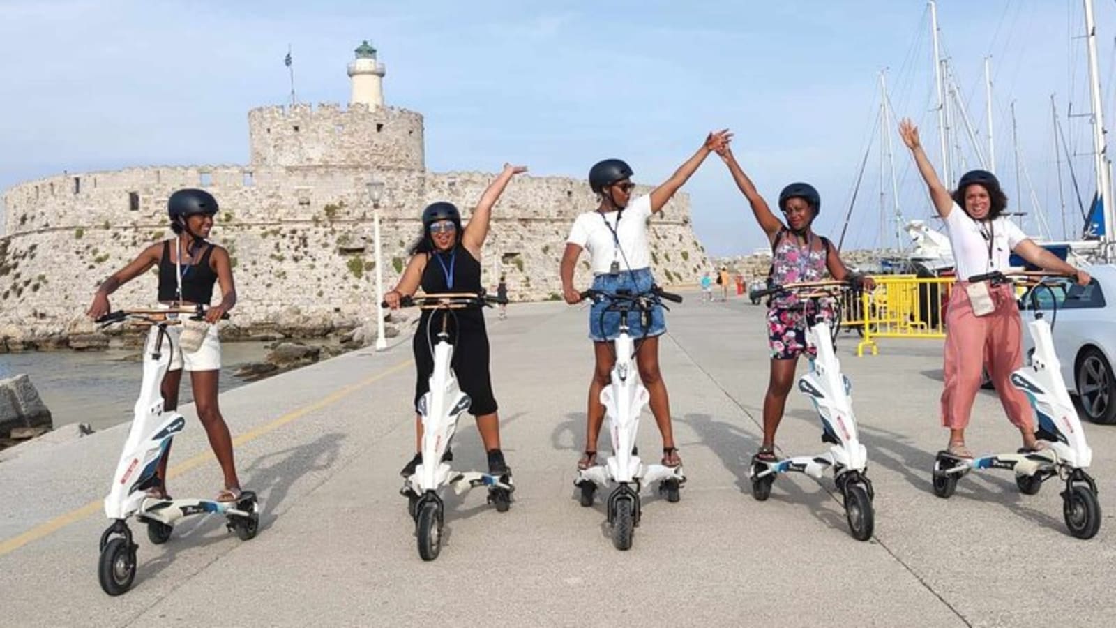 Explore the new town and the medieval town of Rhodes on scooters 3 hours