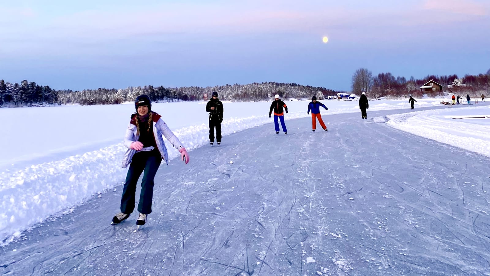 Ice-skating on frozen lake