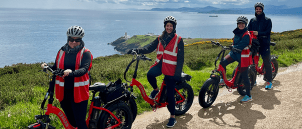 Electric biking Howth's coastal peninsular. Dublin. Guided.