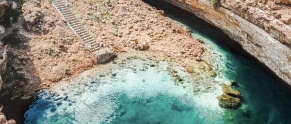 9-Hour Wadi Shab and Bimmah Sinkhole Tour from Muscat