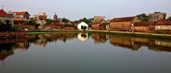 Full-Day Duong Lam Ancient Village Tour from Hanoi with Cycling