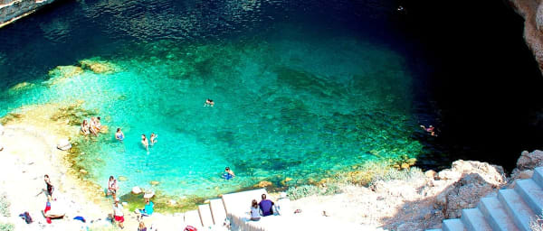 8-Hour Wadi Shab Trek from Muscat with Cave Waterfall Swim