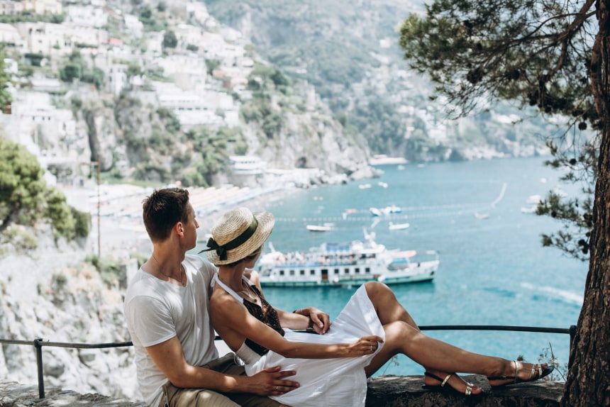 Couple enjoying the coastal beauty of Positano.