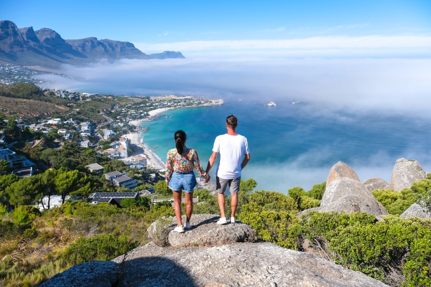Couple enjoying views over Camps Bay in Cape Town.