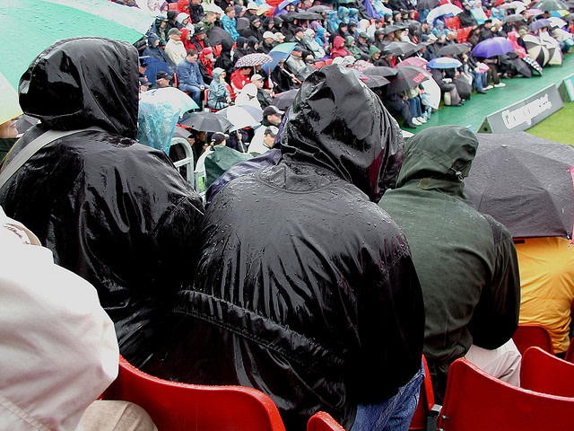 Watching Game in Rain