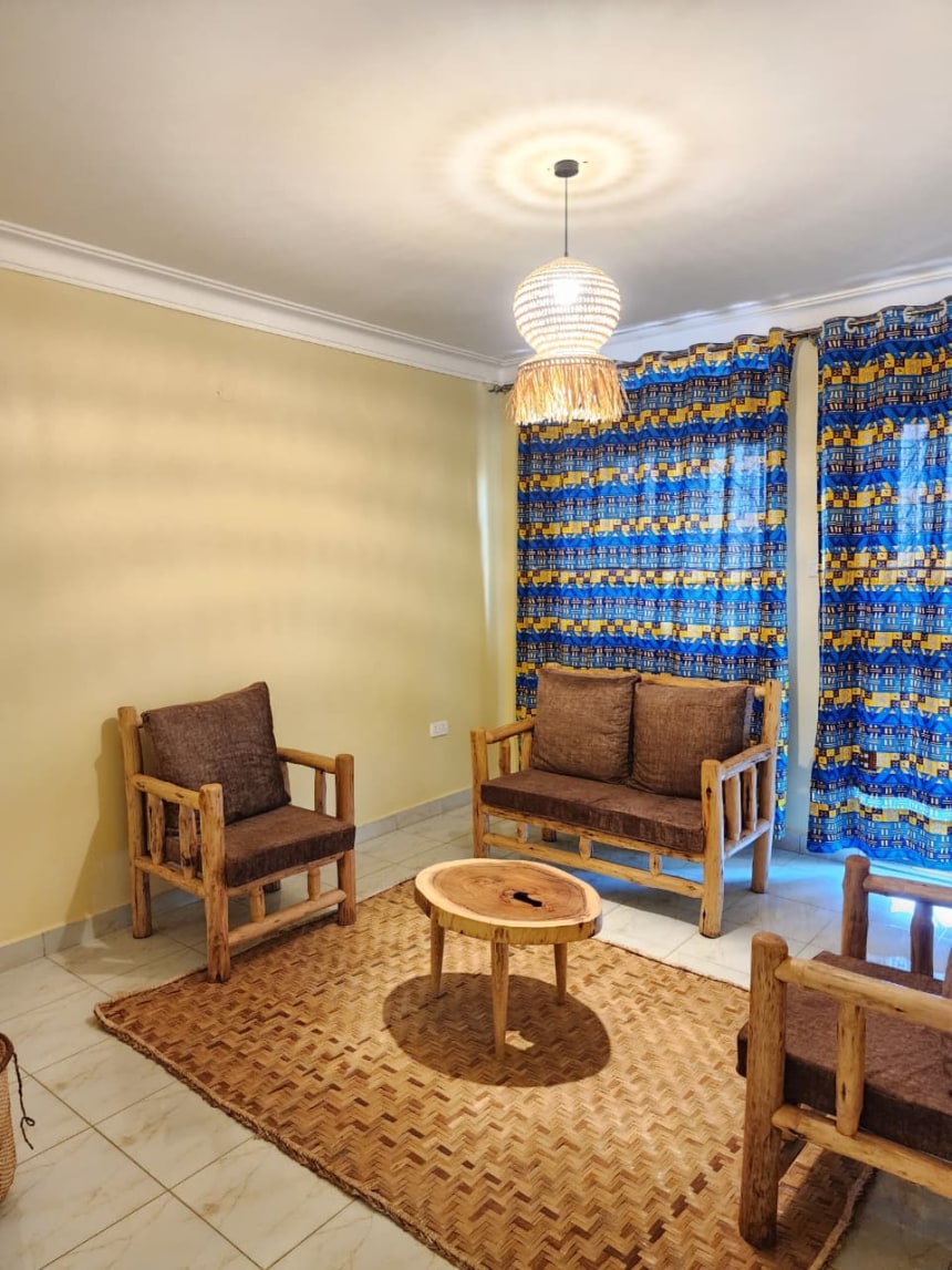 A warmly decorated room at Nyanja View Resort, Fort Portal Uganda