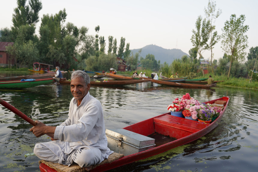 Local selling flowers on Shikara