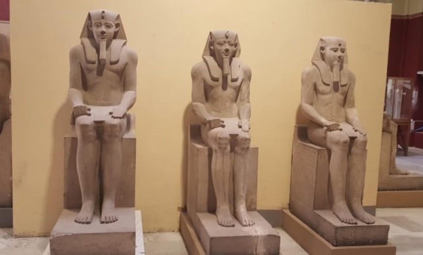                                                                                                  Three statues of King Senusret I