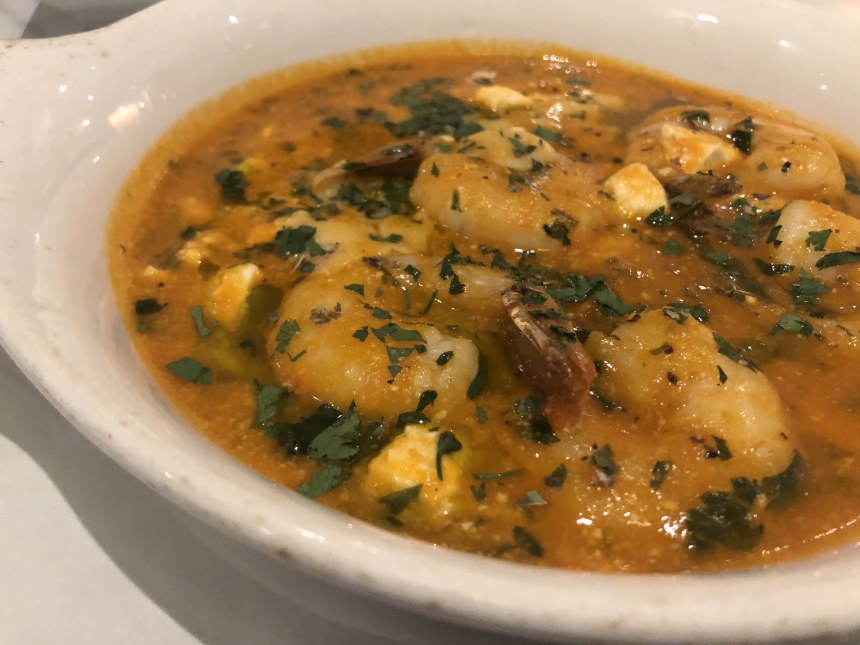 Prawns in spicy tomato sauce with feta