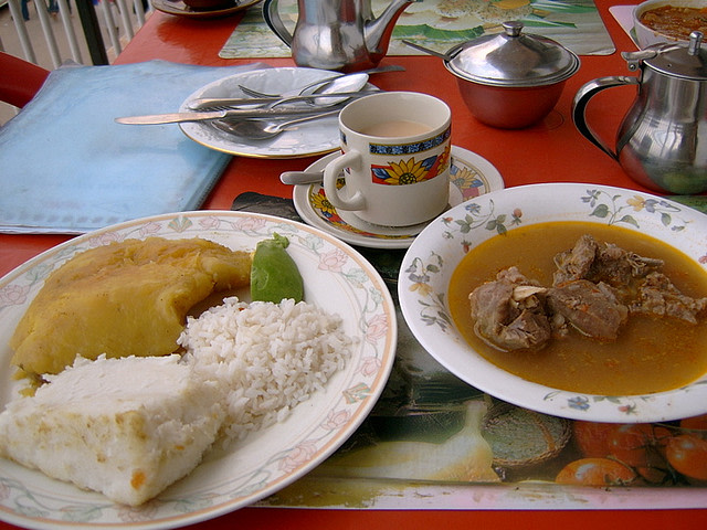 Dinner in Mbarara, Uganda - Matoke, Posho, Rice, and Goaty Sauce