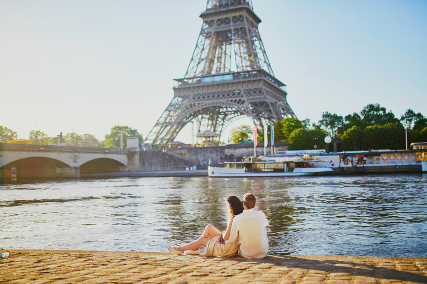 Couple enjoying a romantic moment in Paris.