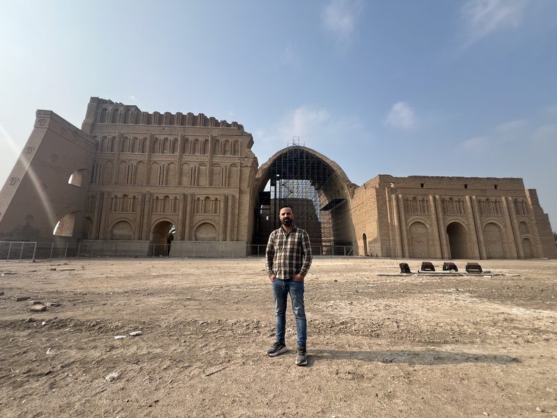 Ali in front of the Arch of Ctesiphon