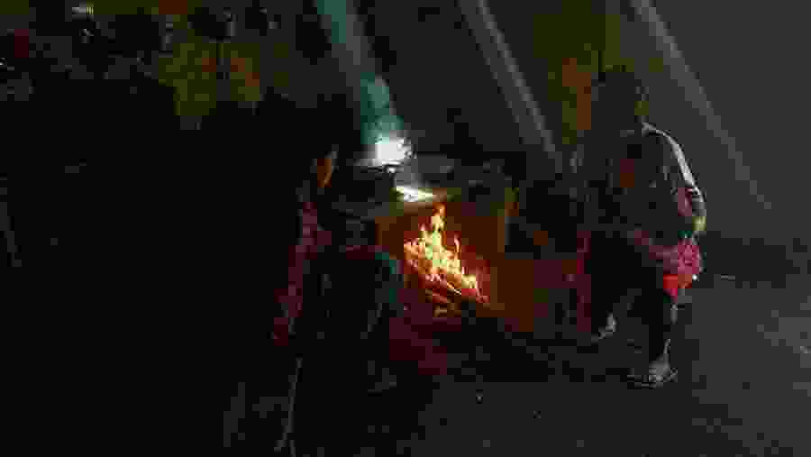 local tribes make a fire to protect the body