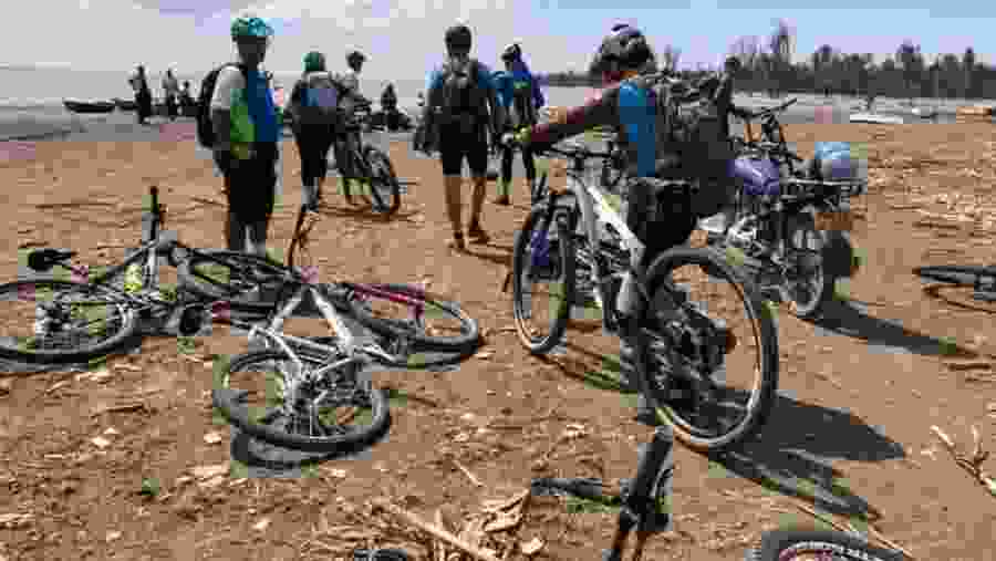 Travellers cycling in Tarangire National Park