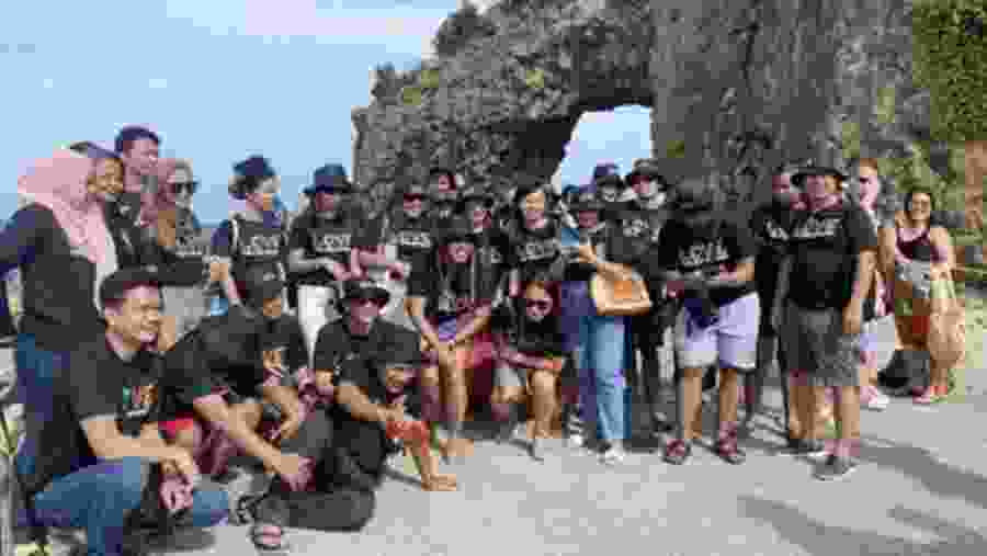Group photo at the beach
