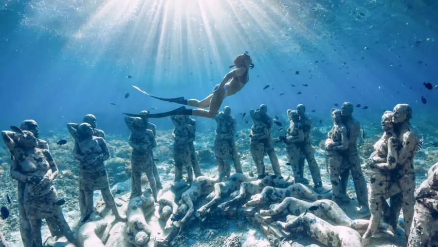 Snorkeling with Underwater Romantic Statues